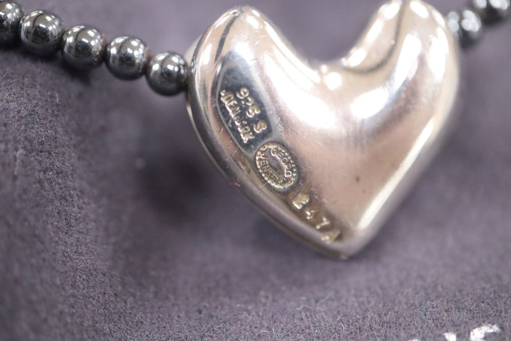 Allan Scharff for Georg Jensen, a sterling silver heart pendant on hematite bead necklace,